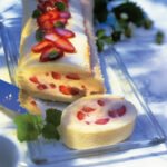 Brazo de nata y fresas