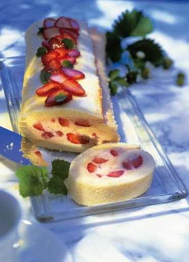 Brazo de nata y fresas